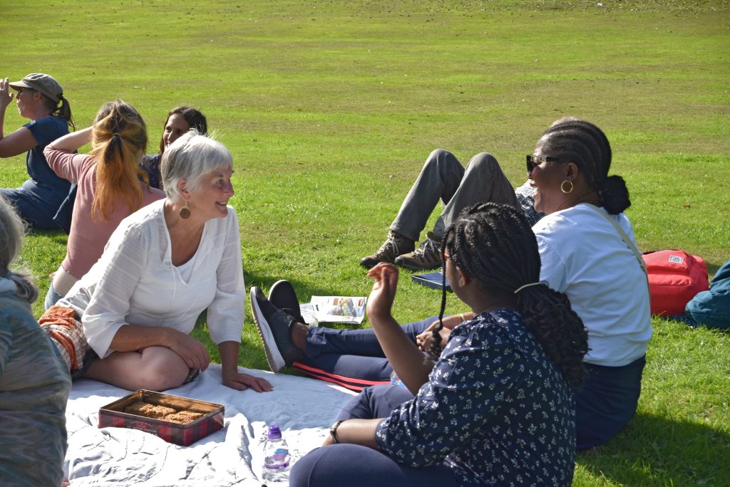 People meeting and talking in the park in Chapeltown